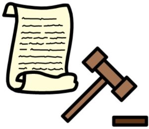 Cartoon drawing of parchment paper partially curled up with squiggles to look like writing. There is a brown gavel to the right.